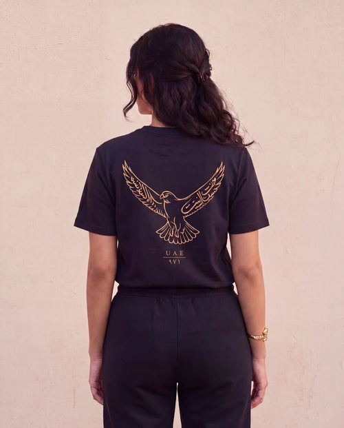 The Falcon Tee back view on model