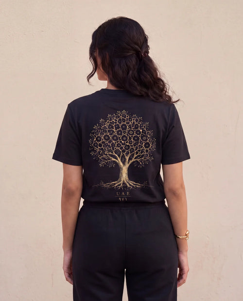 The Ghaf Tee back view on model