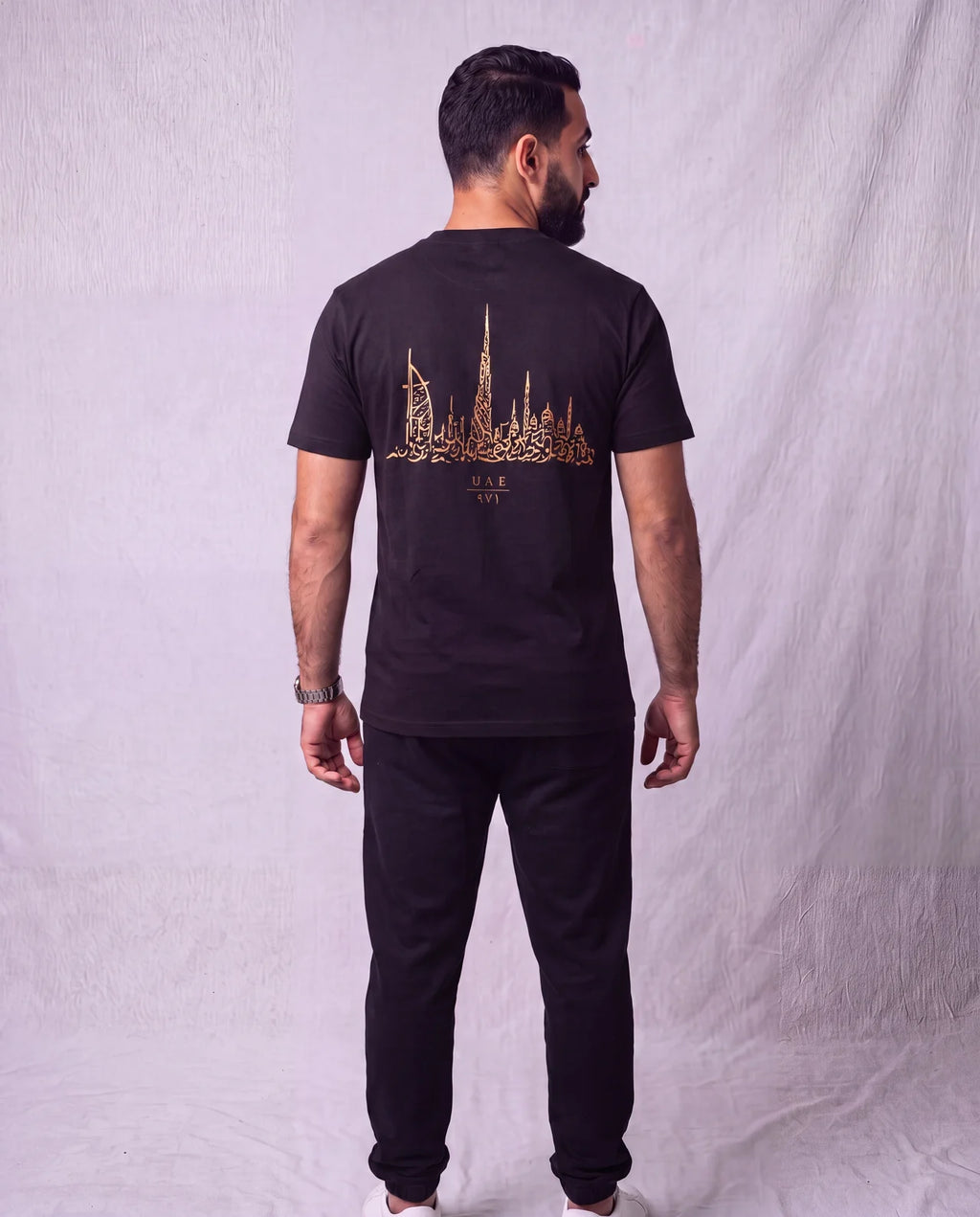 The Skyline Tee back view on model