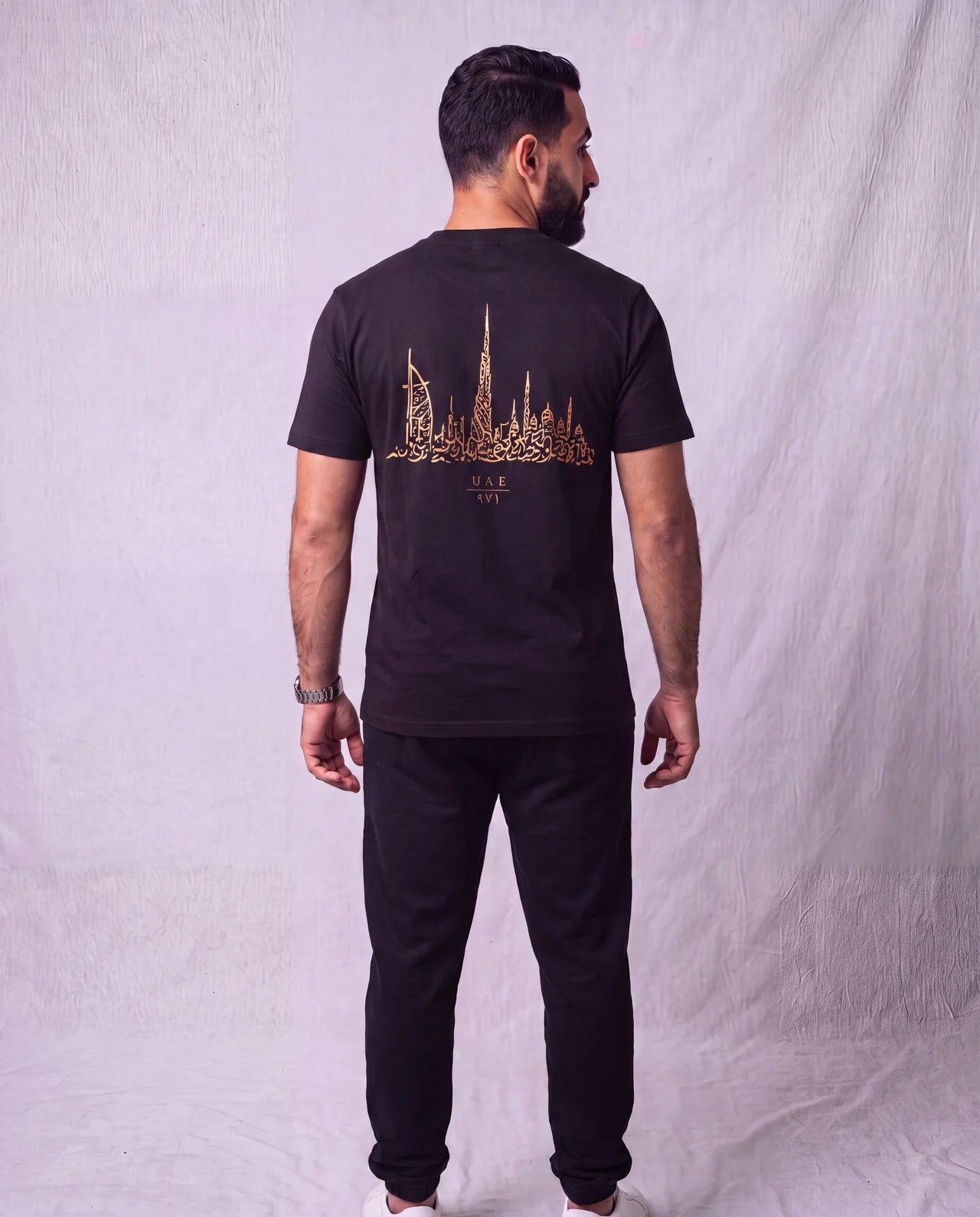 The Skyline Tee back view on model