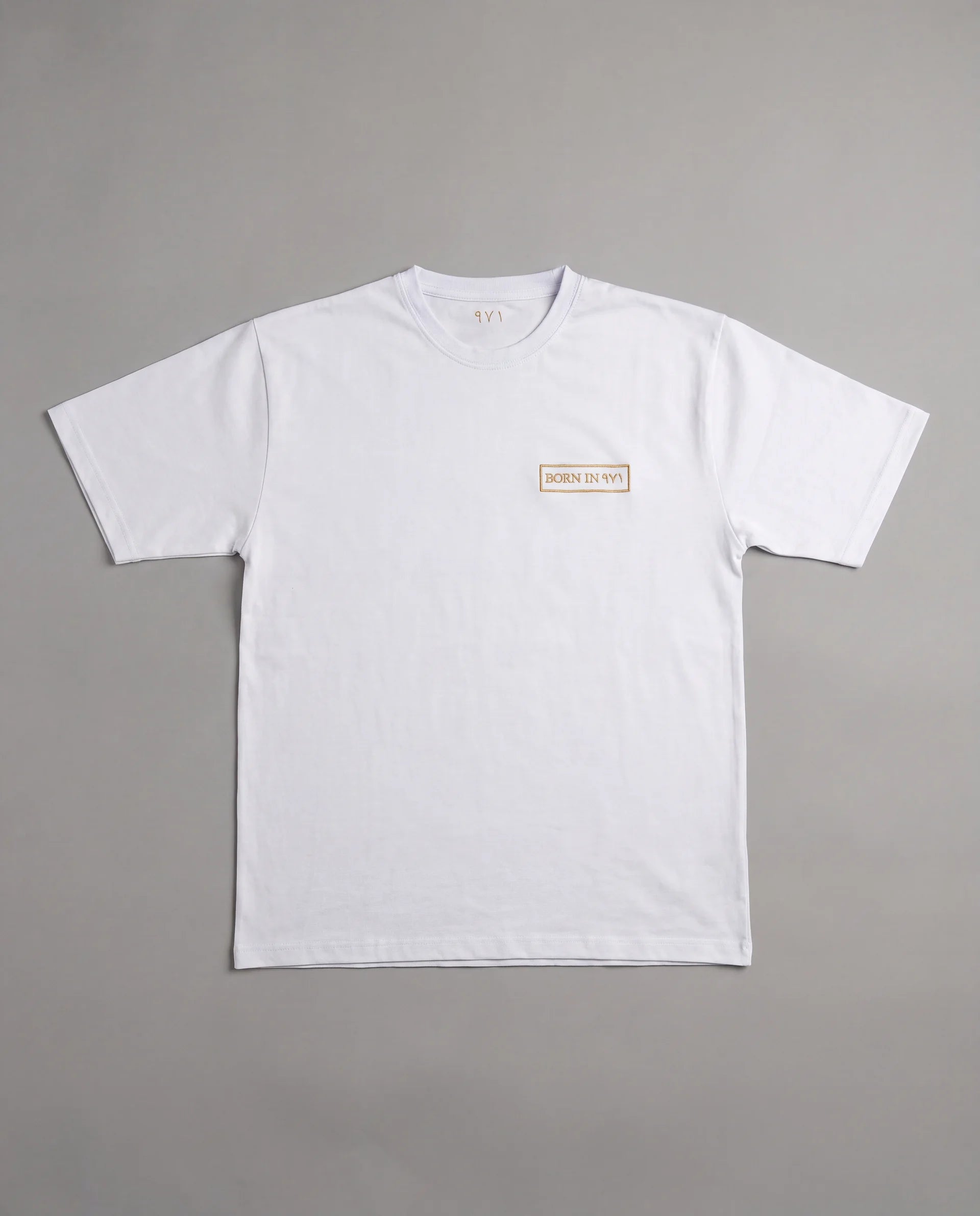 The Ghaf Tee in white, stitched front box logo